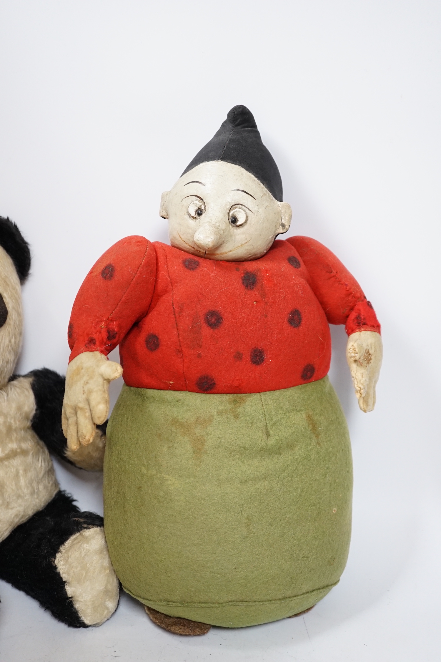 A Katzenjammer Kids 'Misses', felt body and composition face, 36cm high, a Chiltern panda, 1950's, and a Merrythought bull, 1950's (hair loss)